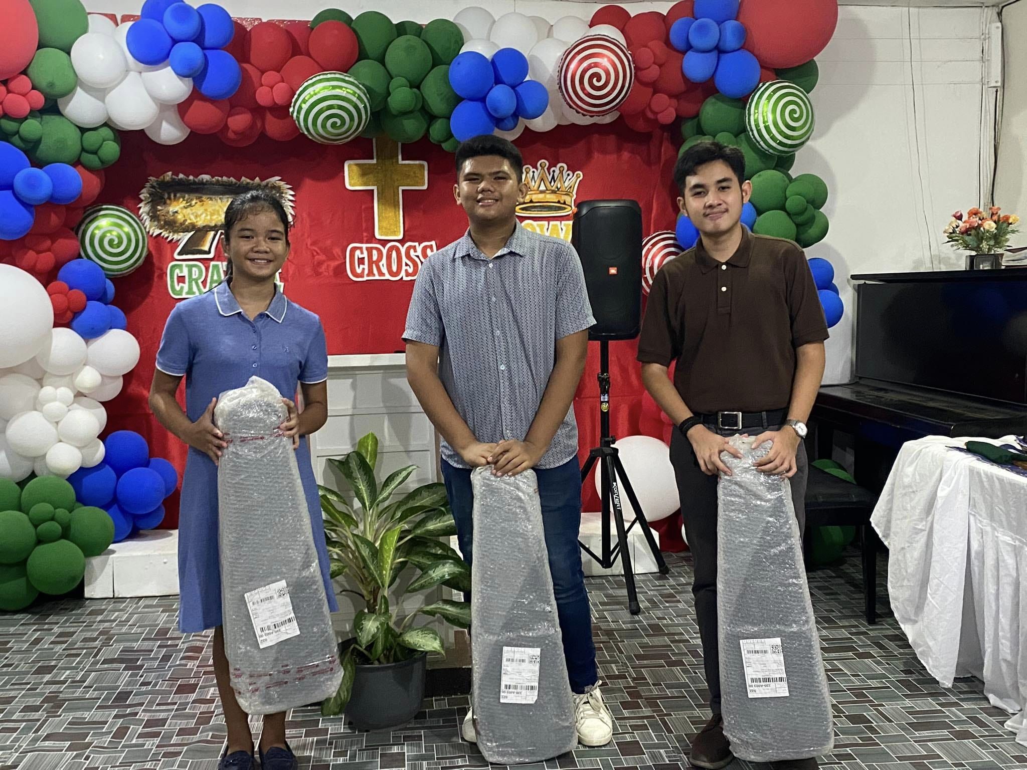 3 young Christians from Iloilo received violins from GTBC