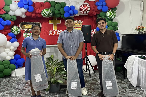 3 young Christians from Iloilo received violins from GTBC
